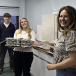 Food helpers, Gabe, Millie, and Vicky.