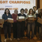 Quiz winners 'Who Dares Gins' with Gary, Susan, Jo, Jess, Adrian, Vicky, Dan, and Christina.