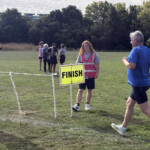 Darren crosses the finish line